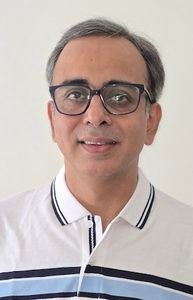 Image is of the tutor giving tuitions.